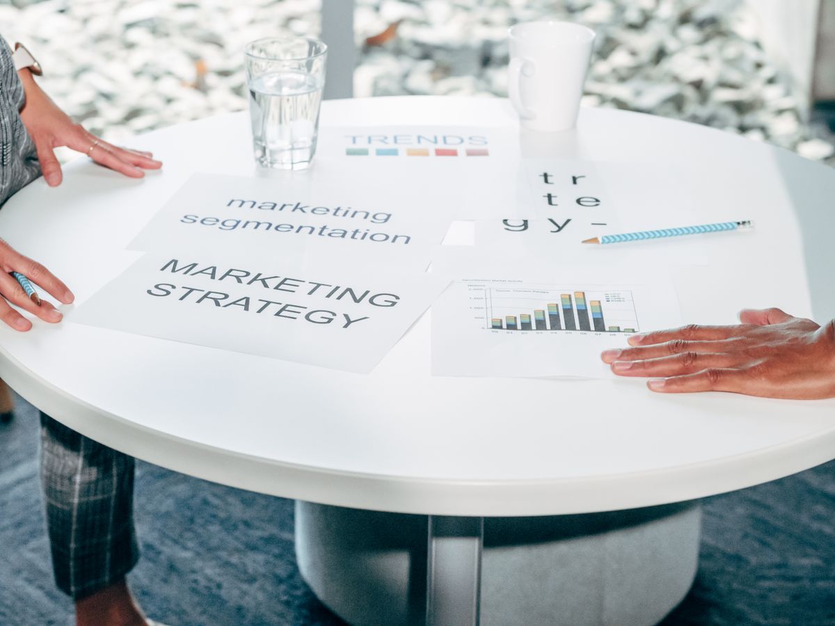 A marketing strategy and segmentation discussion around a table