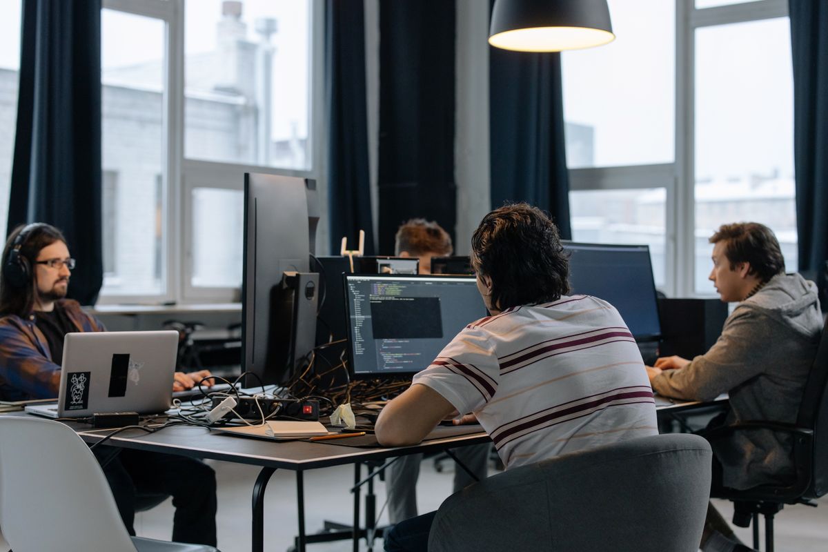 A development team working together at their desks
